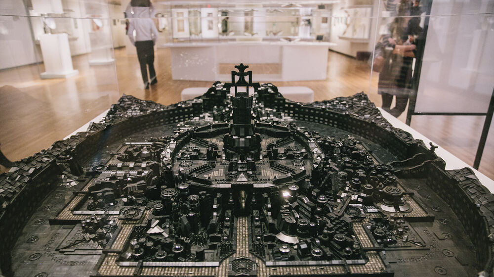 A fortified cityscaped constructed of approximately 100,000 black LEGO piece.